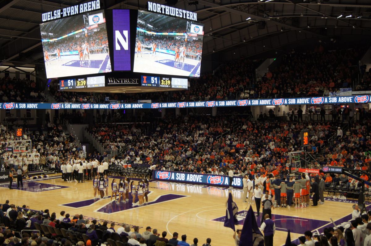 Jersey Mike's signage around the court at a college basketball game