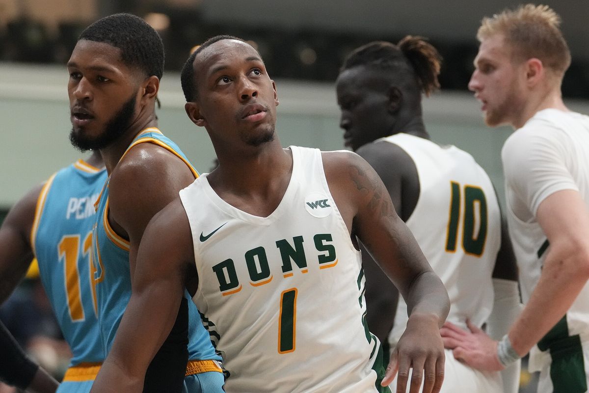 San Francisco Dons basketball player in a Dons jersey